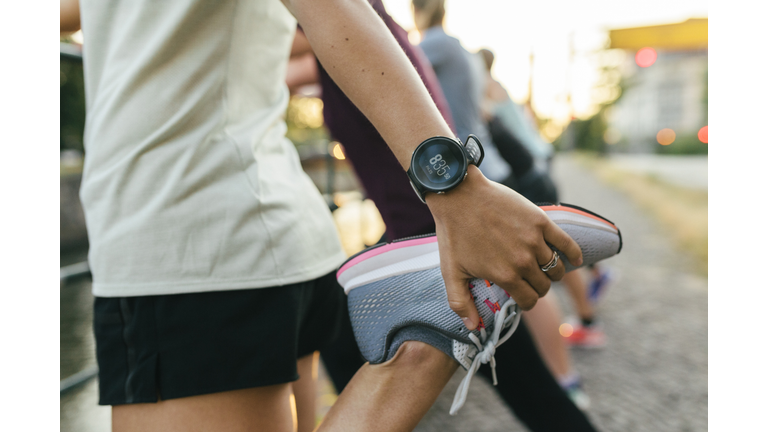 Close Up Of Woman Stretching Before Run