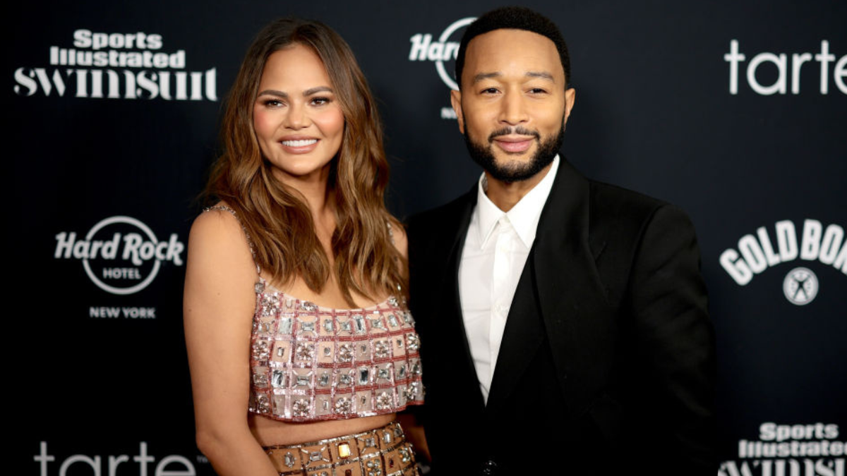 Chrissy Teigen shows surgical scars on rare date with John Legend