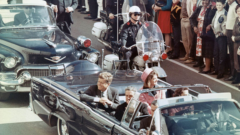 Kennedys Riding in Dallas Motorcade