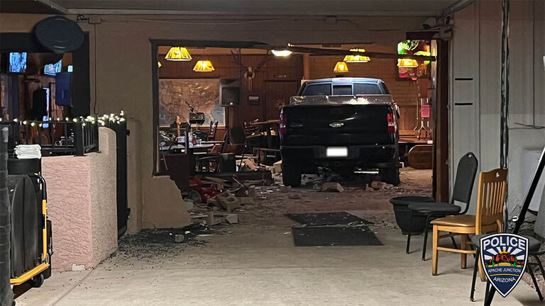 A suspected drunk driver crashed into a building