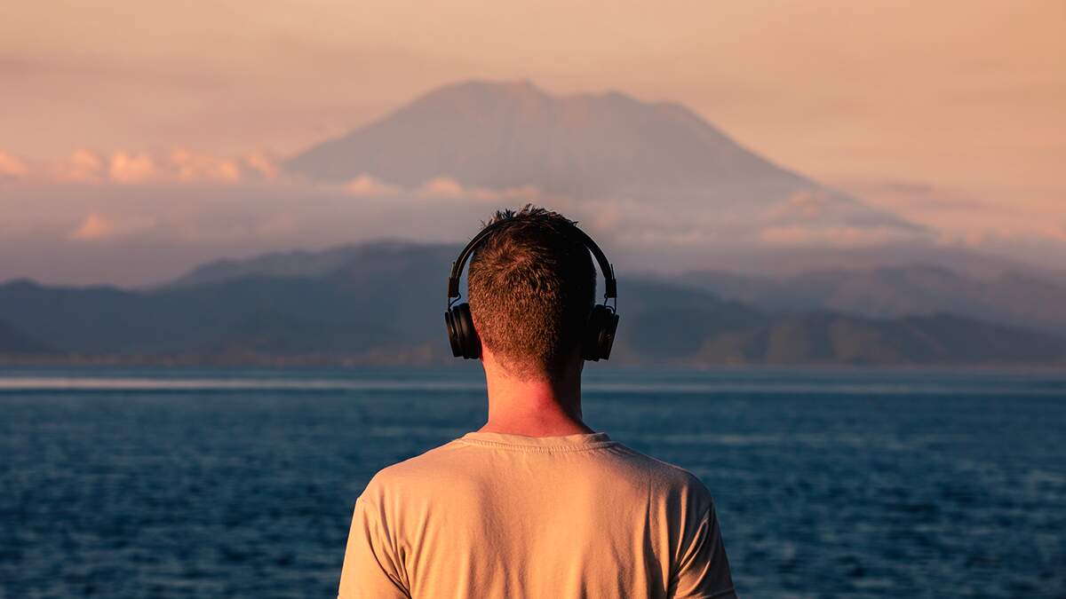 The Best Travel Podcasts To Listen To | 102.7 KIIS-FM