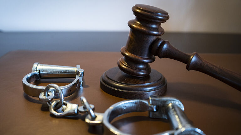 Gavel and handcuffs