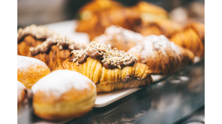 Fresh hot and gold French bakery on trays