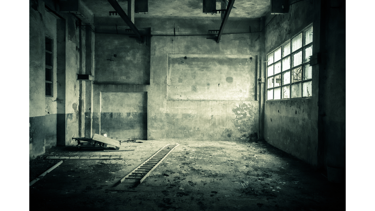 Abandoned room with broken window