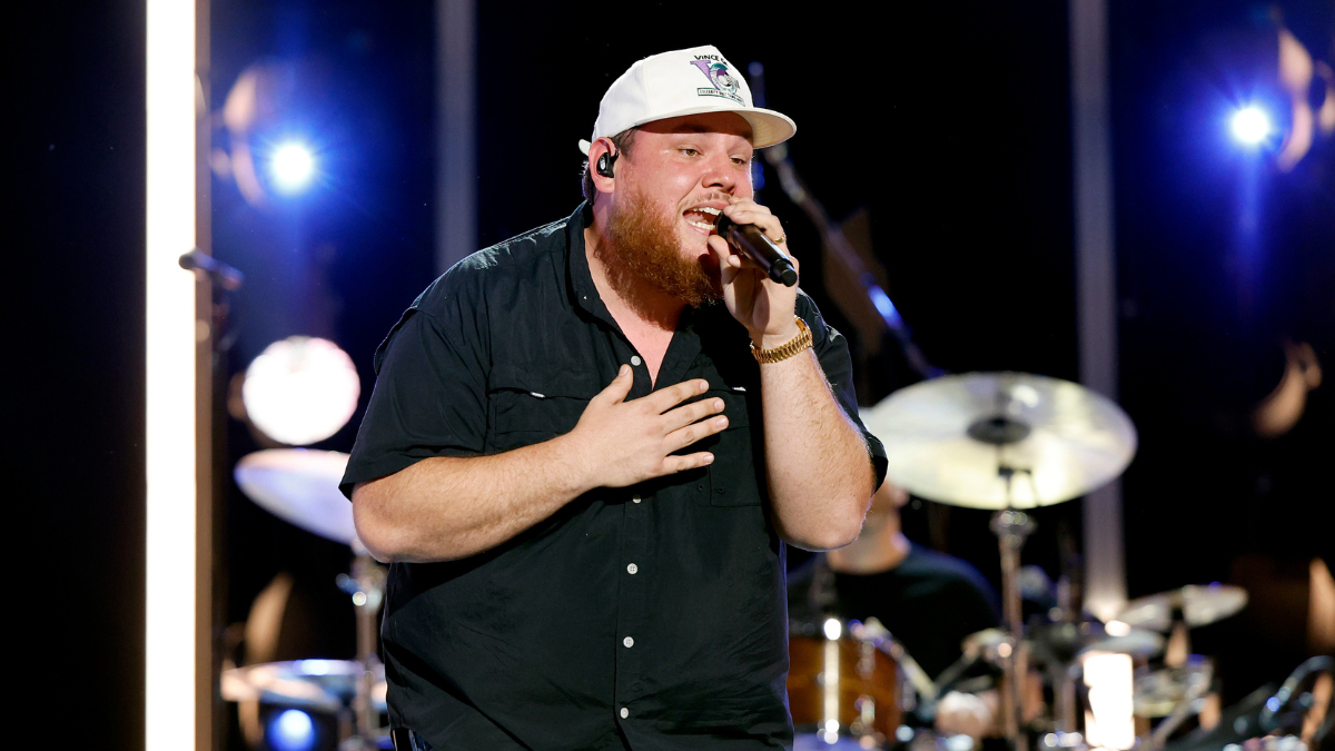 Watch Luke Combs Get An Epic Surprise On Stage | iHeartCountry Radio