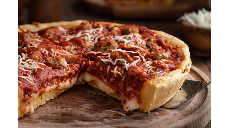 Sliced Sausage Deep Dish Pizza