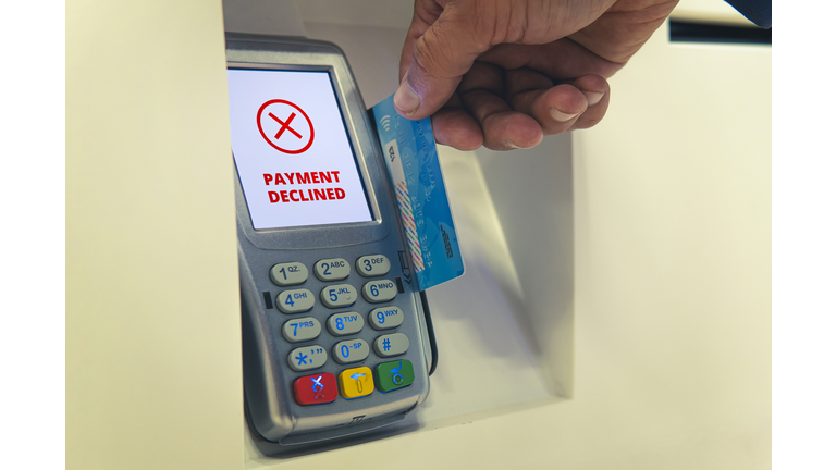 The payment was rejected. Payment by card at the terminal. I ran out of money on my credit card. The debit card bank account is blocked. Concept. Credit card swiping failed.