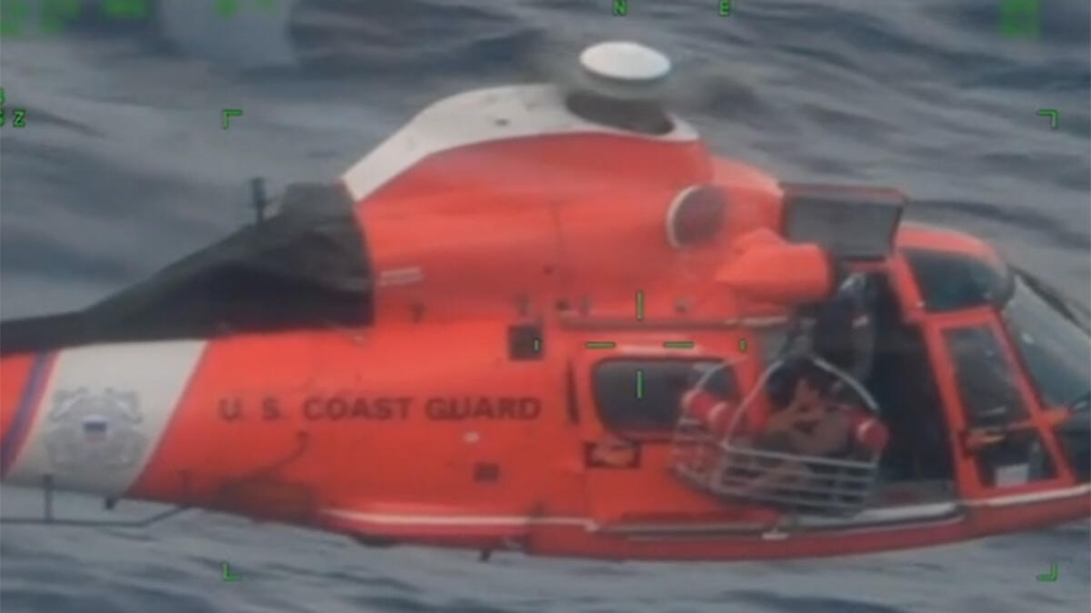 Watch Coast Guard Rescues Father And 2 Sons From Capsized Boat Near