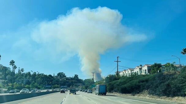 Fast Moving Brushfire Prompts Evacuations and Road Closures in College Area