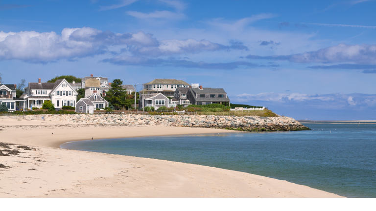 Harbor view, Cape Cod seashore with white sand beach & homes