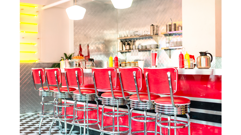 Red stools at the cafe counter