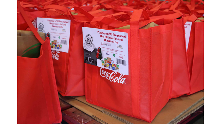 Coca-Cola Red Bags - Man Calendar Image