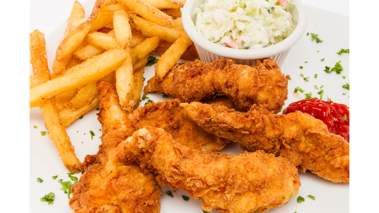 Fried chicken tenders with sides.