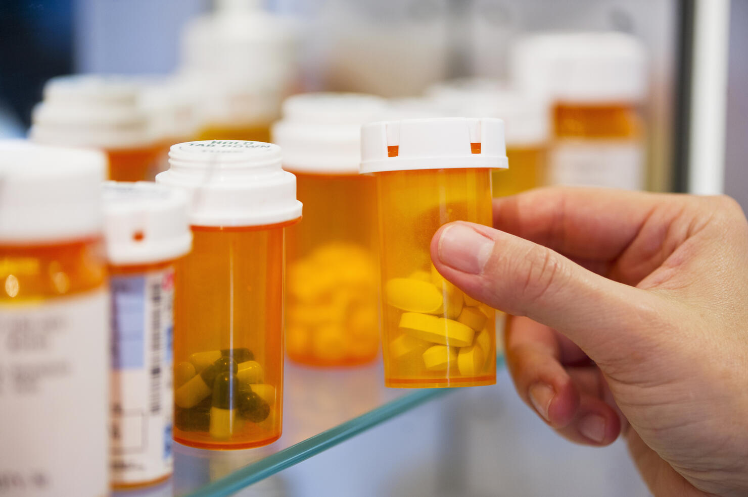 Pill bottles on shelf