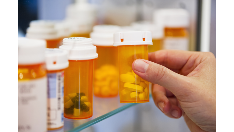 Pill bottles on shelf