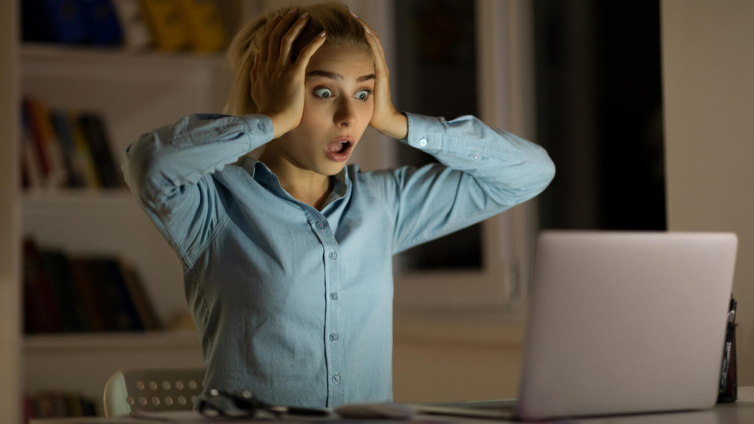 Shocked woman at night