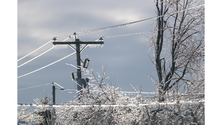 Electricity cables covered in ice after frozen rain phenomenon