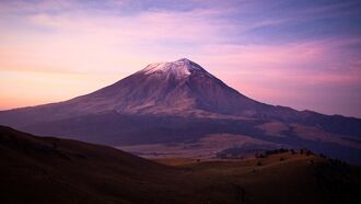 Watch: Glowing Triangular UFO Spotted Flying Near Mexican Volcano