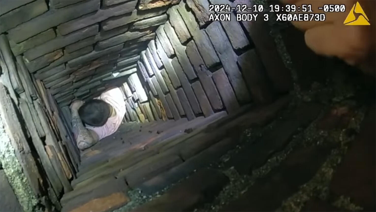 Robert Langlais stuck in a chimney