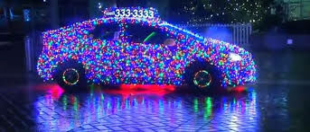 Car Decked Out In Holiday Lights