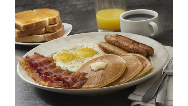 Grand Slam Breakfast with Pancakes, Bacon, Eggs, and Toast