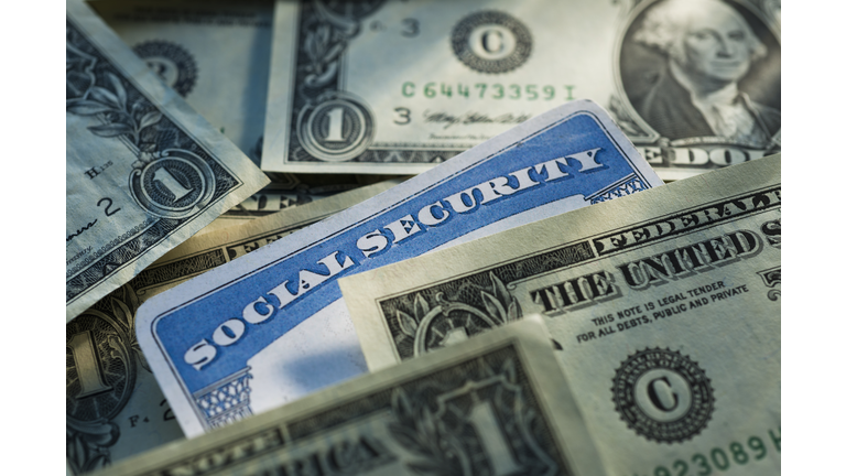 Studio shot of social security card and banknotes