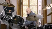 Watch Phil Collins Sit Behind Iconic Drum Kit For First Time In A Decade