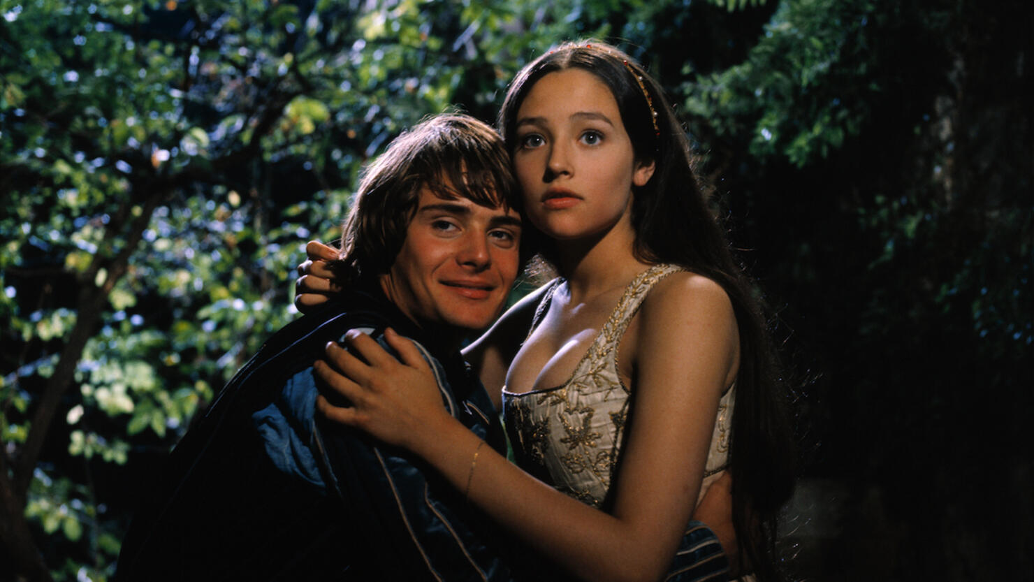 Olivia Hussey and Leonard Whiting Embracing