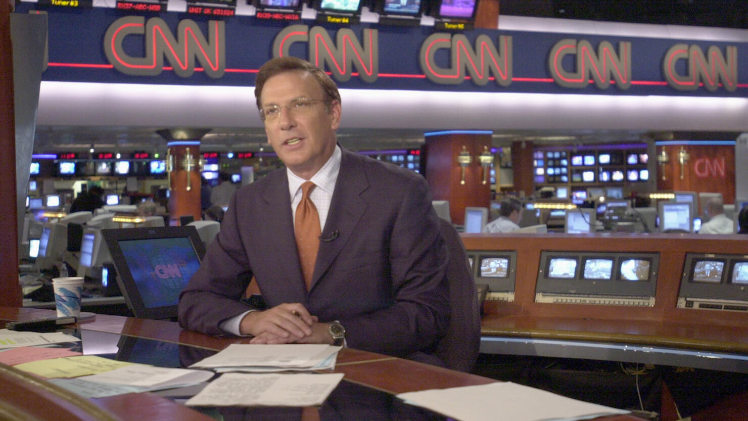 CNN Anchor Aaron Brown Delivers News