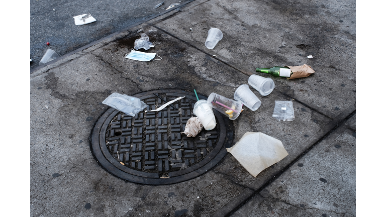 Garbage objects left on floor in public space
