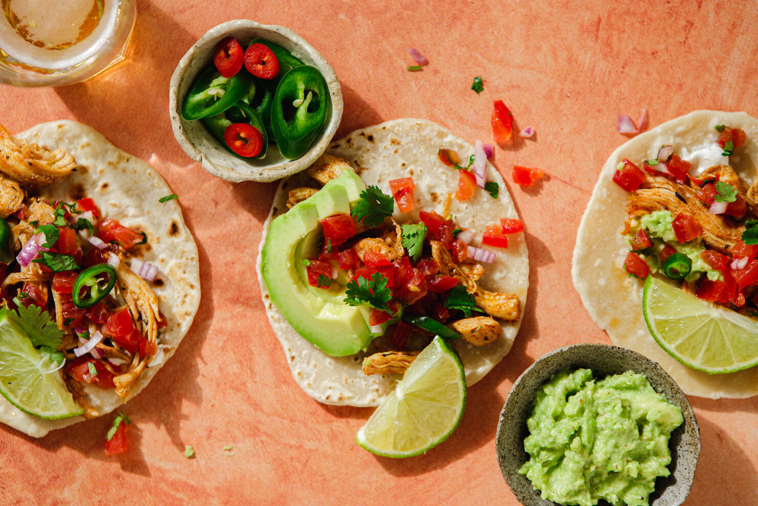 Delicious stuffed tortillas with avocado guacamole on the table