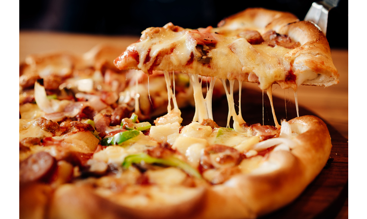 Close-Up Of Pizza On Table