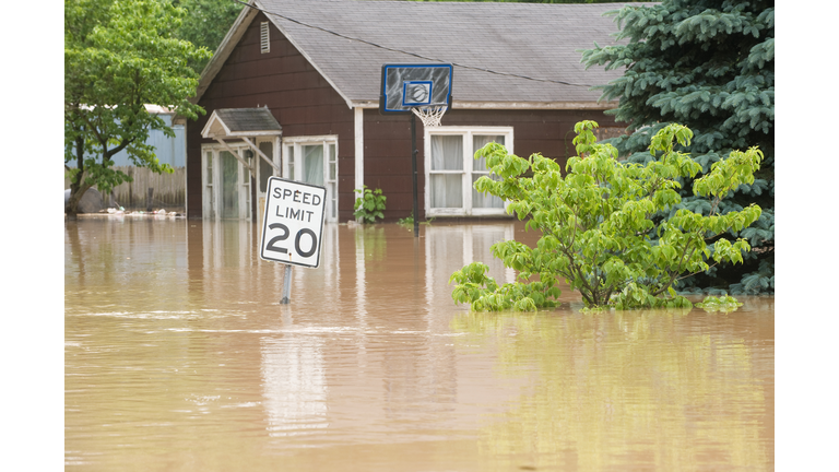 Flood waters in an Indiana town with flooded homes