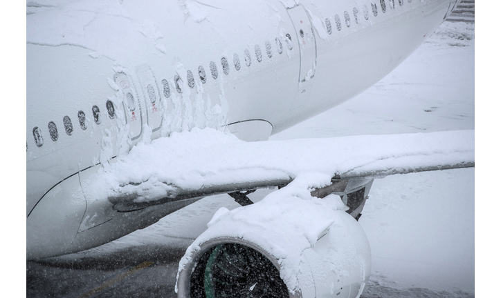 Aircraft covered with snow