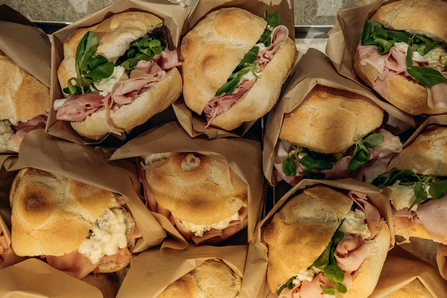 takeaway sandwiches bun with salami and mozzarella