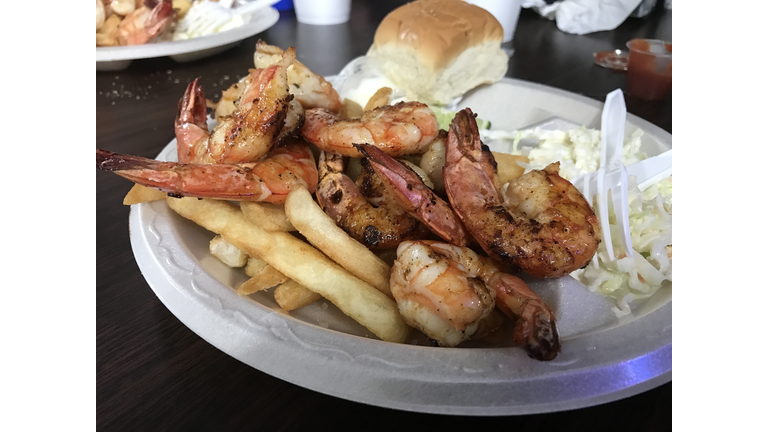 Chargrilled large shrimp and fries in South Texas USA