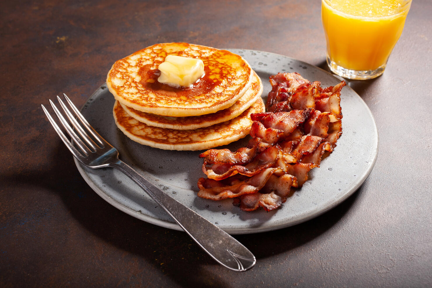 sweet pancakes with butter and bacon. traditional american breakfast