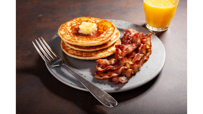 sweet pancakes with butter and bacon. traditional american breakfast