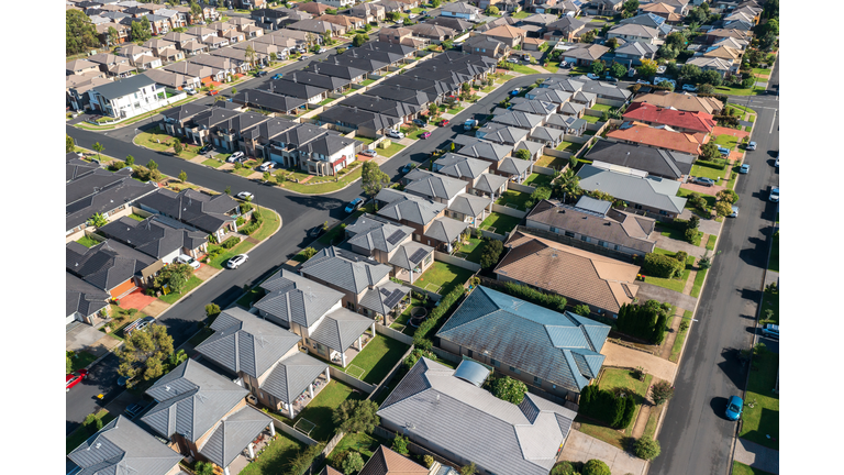 Rows of very similar homes in outer suburban Sydney, Australia
