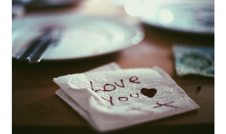 Hand written Love you note on paper napkin