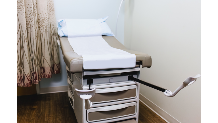 Examination Table With Stirrups in Gynecologist's Office