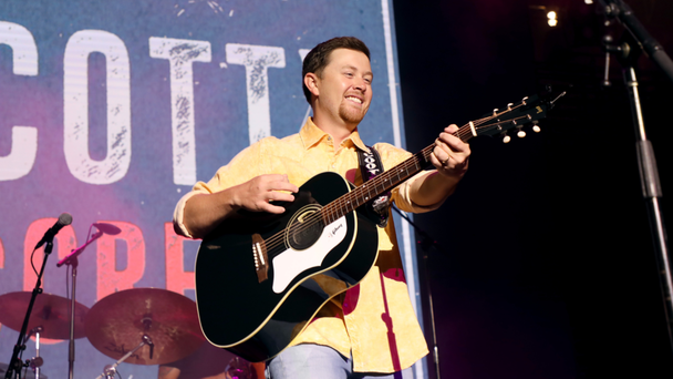 Watch How Scotty McCreery Reacted After Falling Backwards On Stage