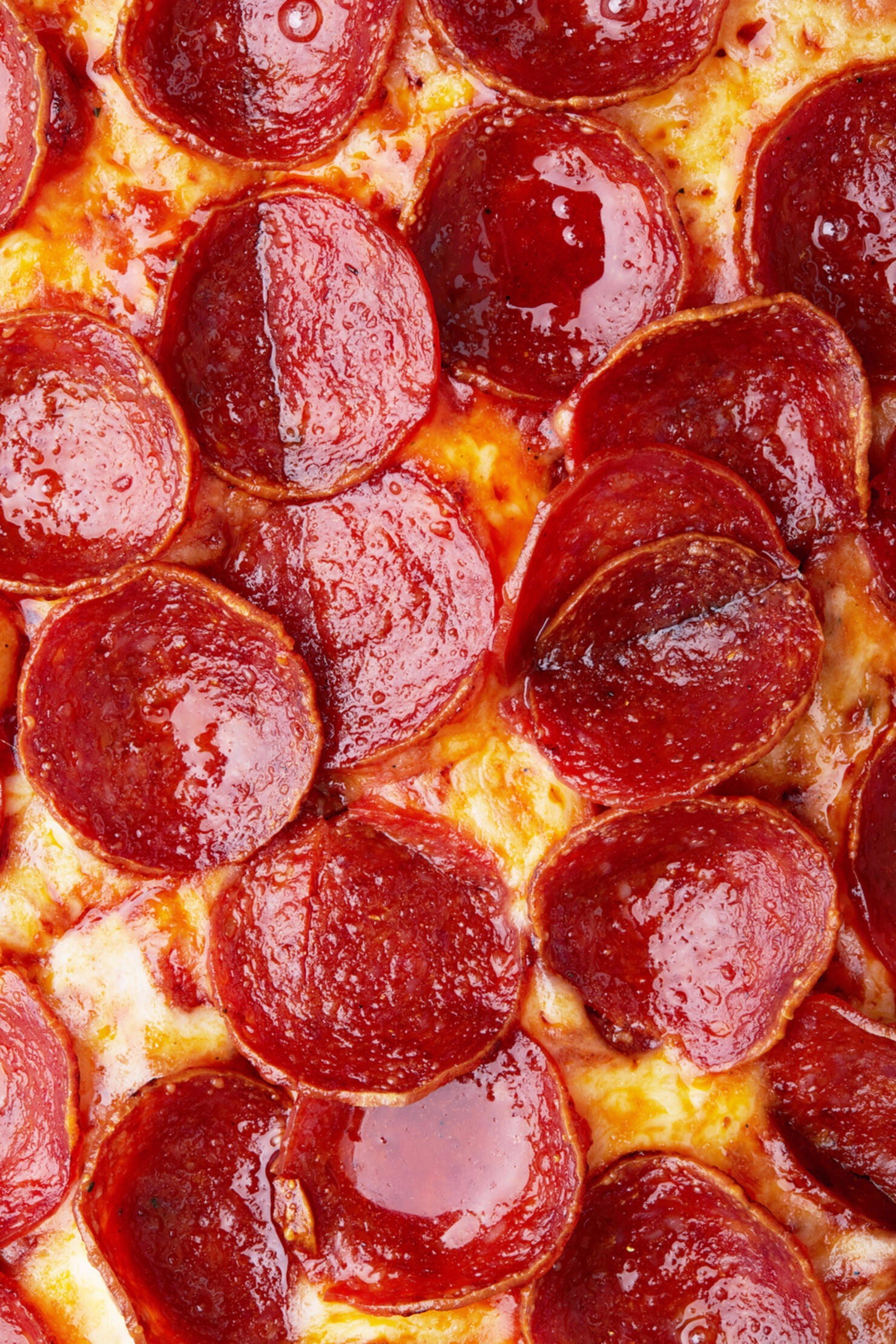 Closeup of Pepperoni pizza as a background