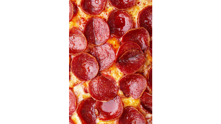 Closeup of Pepperoni pizza as a background