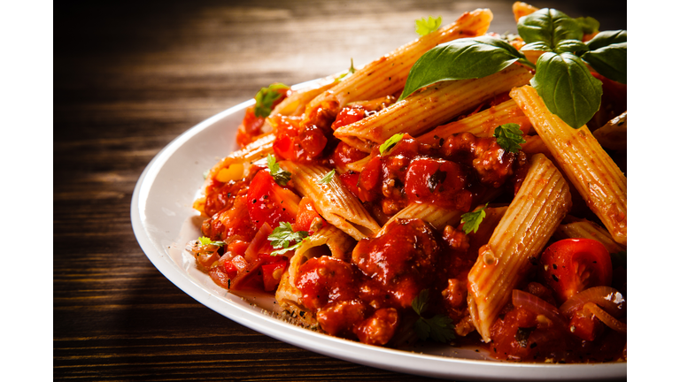 Pasta with meat, tomato sauce and vegetables