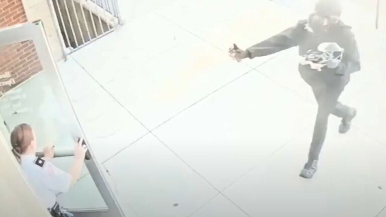 Man with gas mask storms Boston-area courthouse