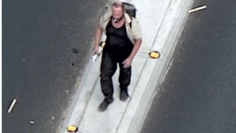 Man sprays police with can of spraypaint