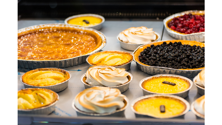 the counter of the cafeteria with different desserts