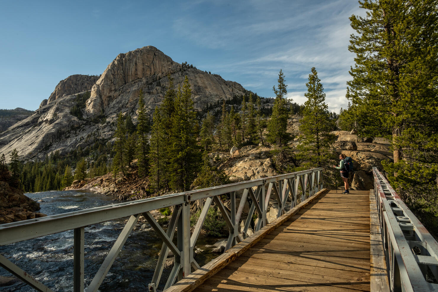 Woman Stops at end of Bridge toward Glen Aulin