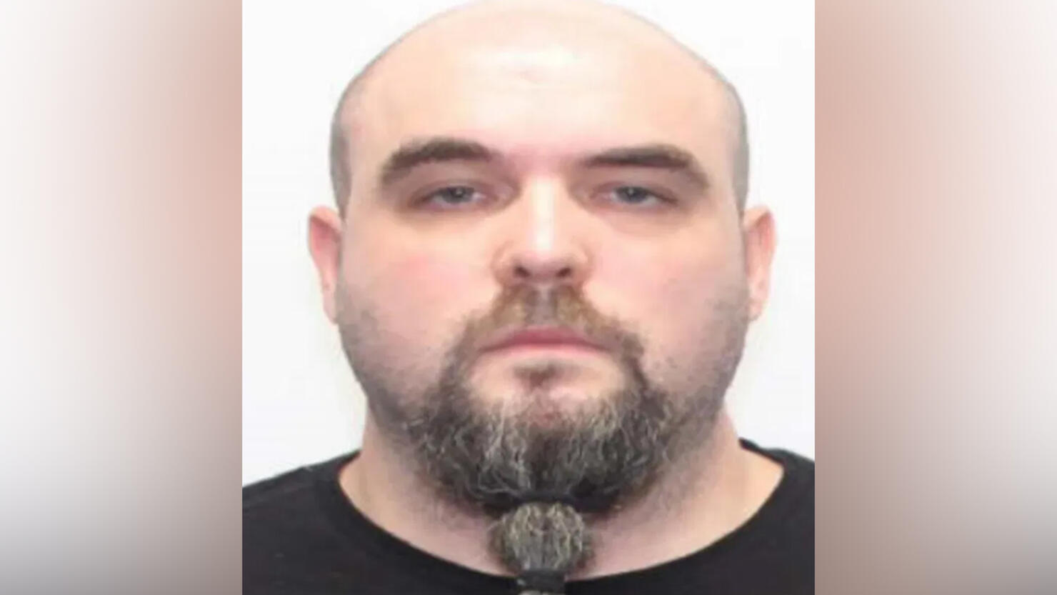 mugshot of Justin Collin Adams